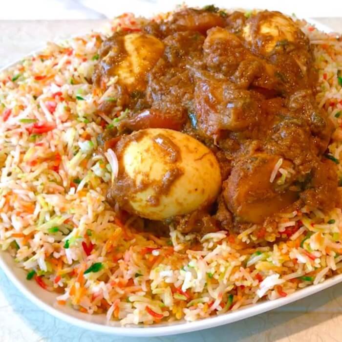Biryani/Tumeric rice,egg curry,vegetable